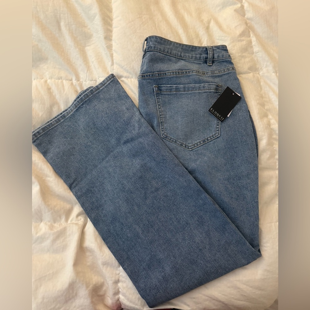 Eloquii Women's medium Blue Distressed flare Leg Jeans
